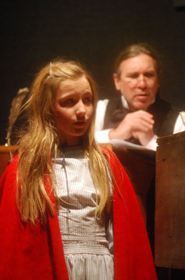 Street Urchin singing for a Penny with Bob Cratchit in background