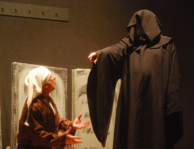 Scrooge beginning the Ghost of Christmas Yet to Come